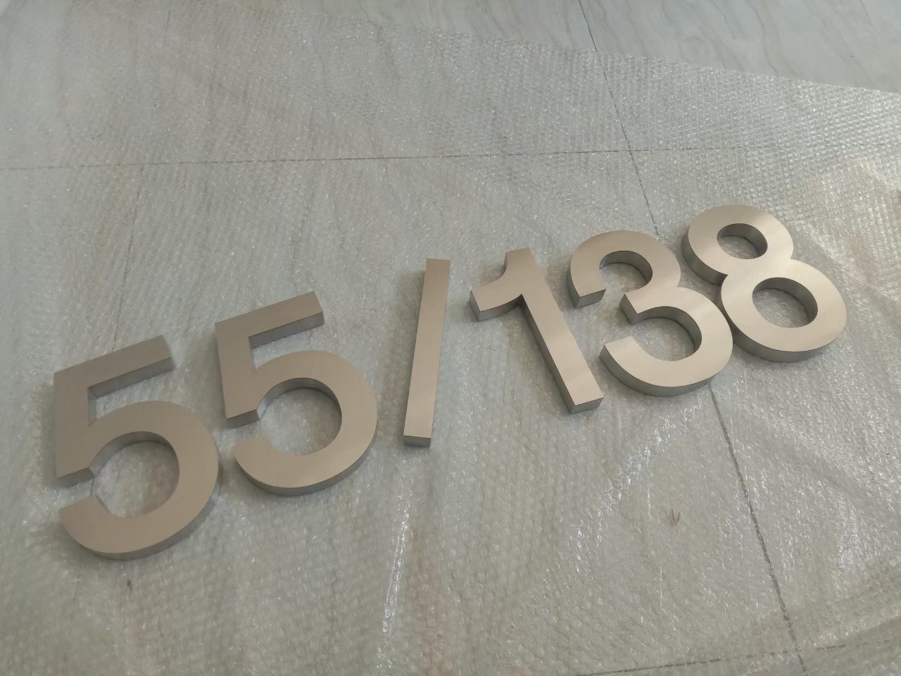 งานป้ายบ้านเลขที่ 55/138