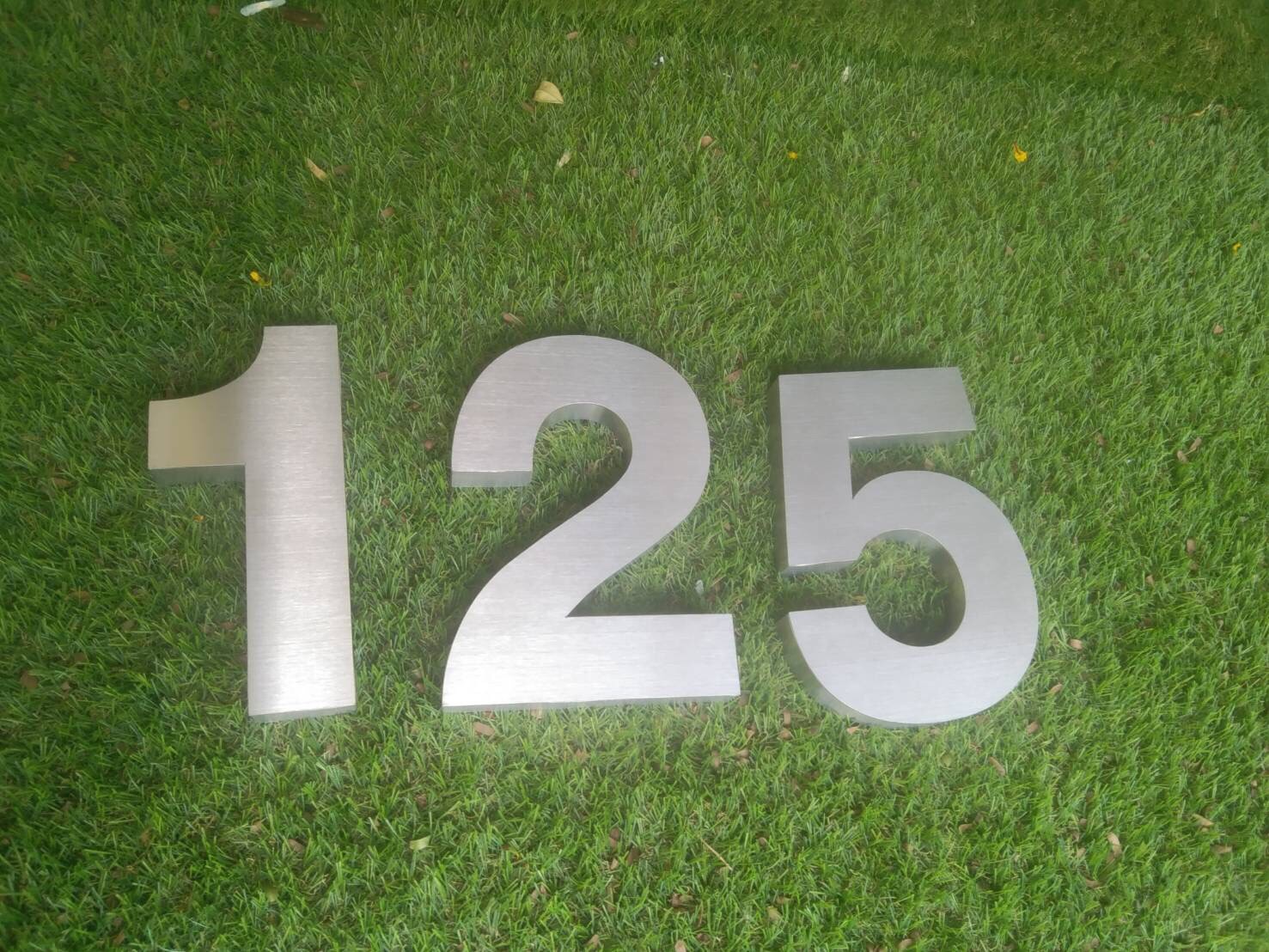 งานป้ายบ้านเลขที่ 125