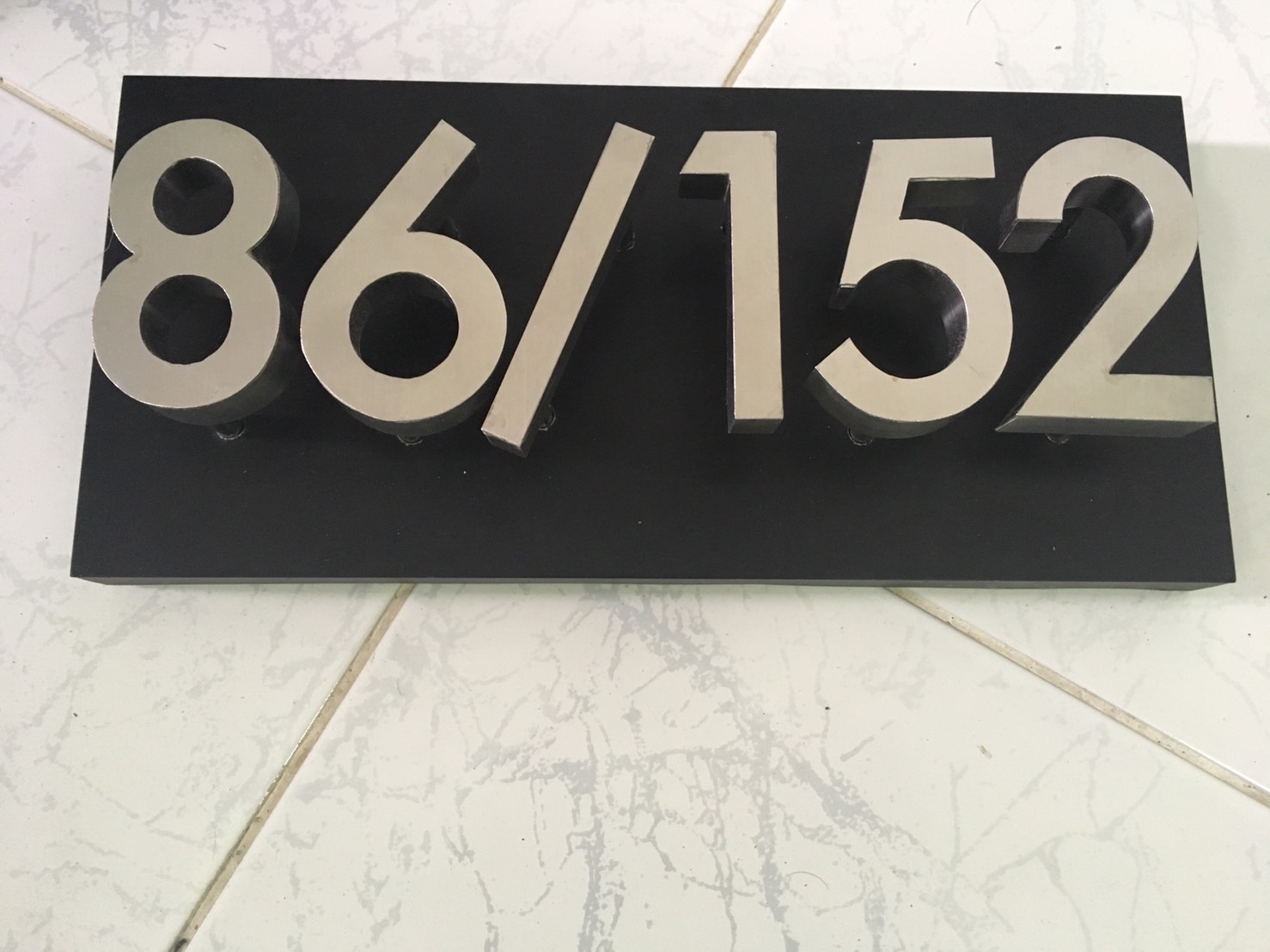 ป้ายบ้านเลขที่ 86/152