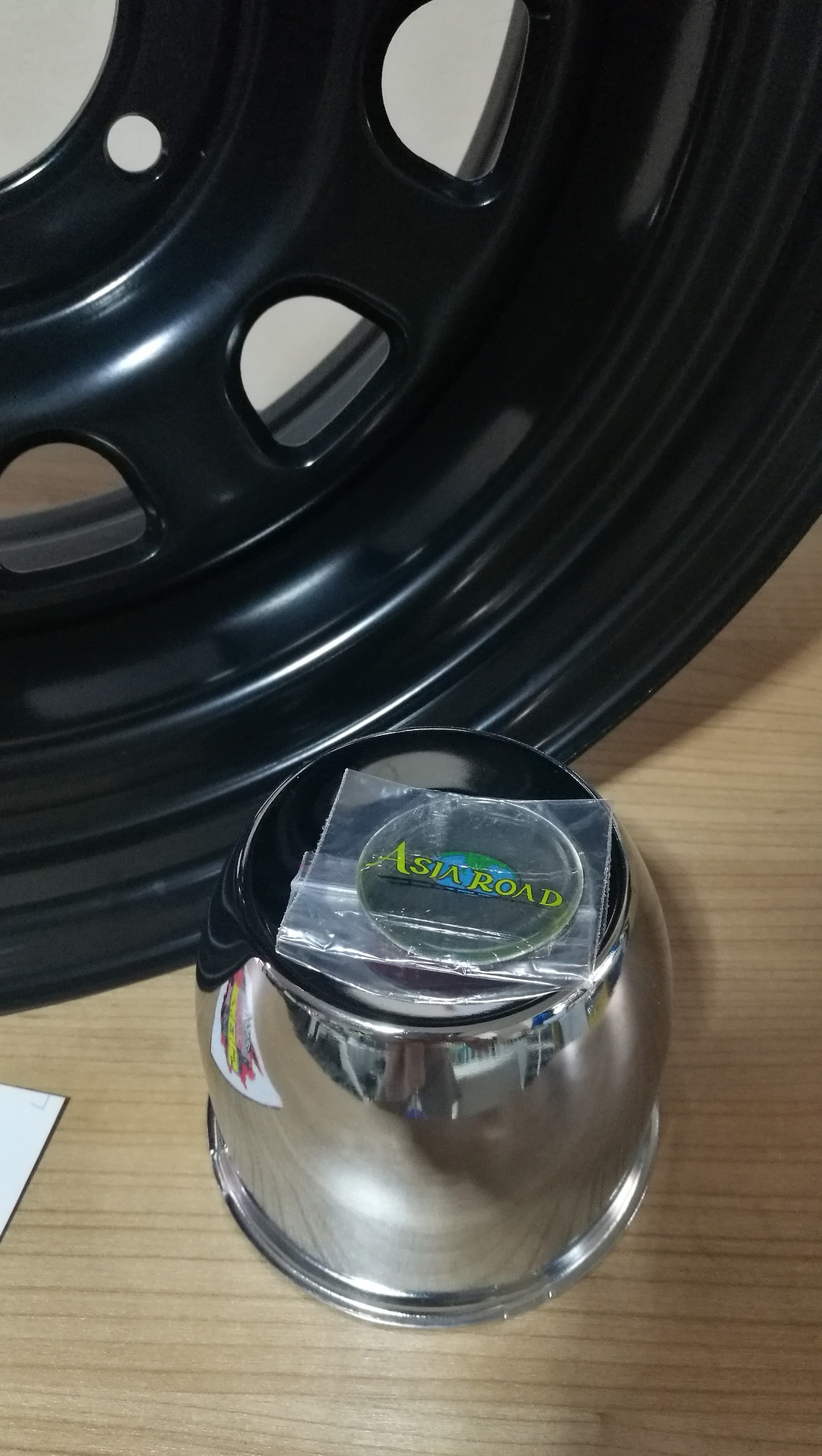 ล้อกระทะนำเข้า Asia Road 16x8"-30 ดำ ลาย UFO-A07 ระฆังคว่ำ พร้อมฝาคอบดุม 6 รู 139.7