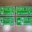 ป้ายกล่องไฟอลูมิเนียม ฐานเหล็ก ป้ายอะคริลิคโปร่งแสง - ป้ายทางหนีไฟ FIRE EXIT